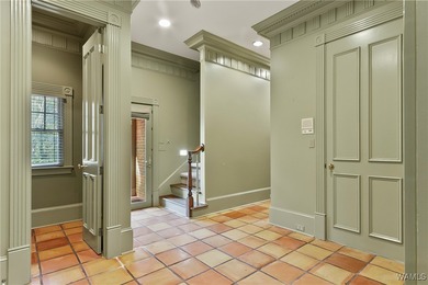 This stunning home is located North of the River in the very