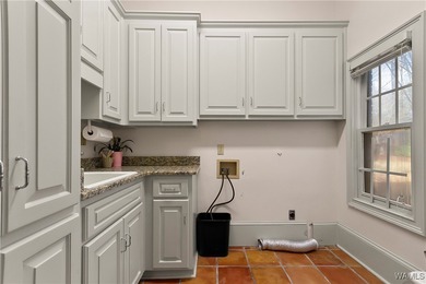 This stunning home is located North of the River in the very