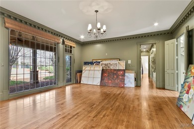 This stunning home is located North of the River in the very