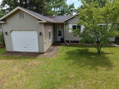 Enjoy lake living on beautiful crystal-clear, spring-fed - photo 2