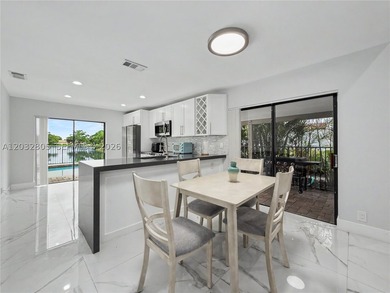 Welcome to this beautifully renovated waterfront gem nestled - photo 12