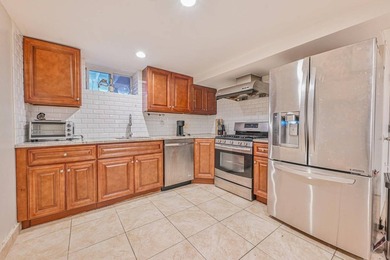 Modern luxury in this fully gut-renovated, legal two-family home - photo 12