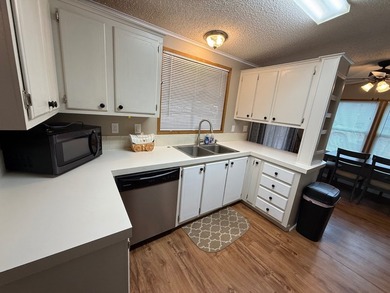 This updated home has a 2018 roof, upgraded windows, upgraded - photo 12