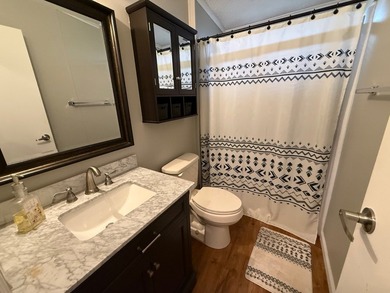 This updated home has a 2018 roof, upgraded windows, upgraded - photo 33