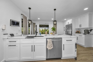 Completely renovated and move-in ready! Situated on two spacious - photo 4