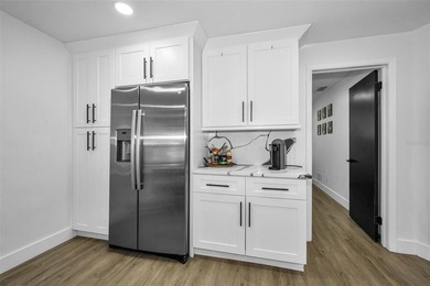 Completely renovated and move-in ready! Situated on two spacious - photo 6