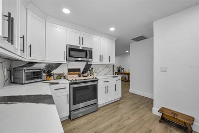 Completely renovated and move-in ready! Situated on two spacious - photo 7