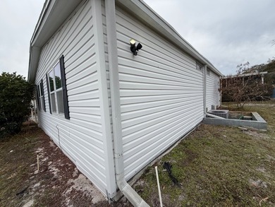 This updated home has a 2018 roof, upgraded windows, upgraded - photo 42