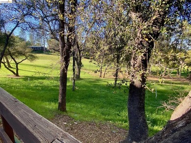 Townhome living on the golf course! Nestled within the gated