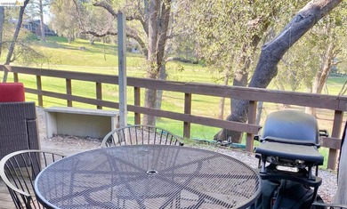 Townhome living on the golf course! Nestled within the gated