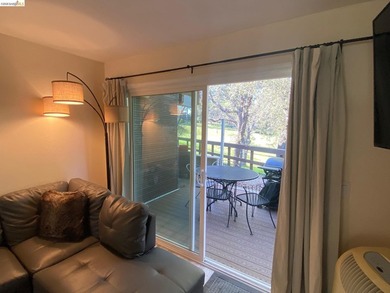 Townhome living on the golf course! Nestled within the gated