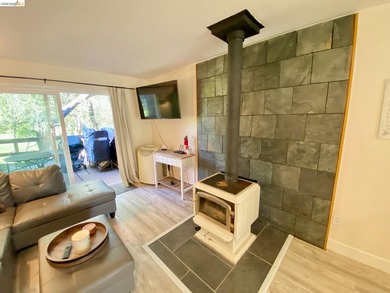 Townhome living on the golf course! Nestled within the gated