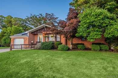 This sprawling brick ranch features a stunning open floor plan - photo 1
