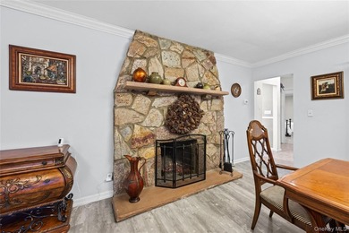This sprawling brick ranch features a stunning open floor plan - photo 3