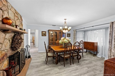 This sprawling brick ranch features a stunning open floor plan - photo 4