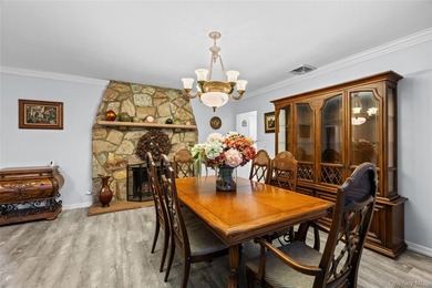 This sprawling brick ranch features a stunning open floor plan - photo 5