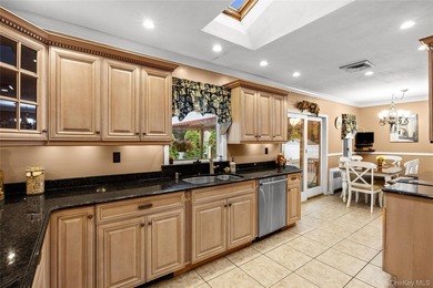 This sprawling brick ranch features a stunning open floor plan - photo 7