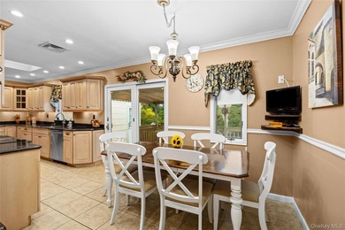 This sprawling brick ranch features a stunning open floor plan - photo 10