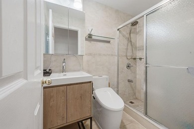 Welcome to this well-maintained semi-detached 2-family home in - photo 12