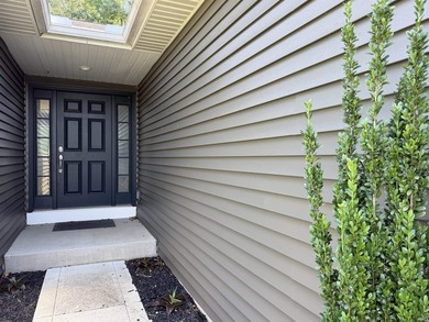 This 2016 ranch enjoys 300 feet of wooded creek frontage on just - photo 3
