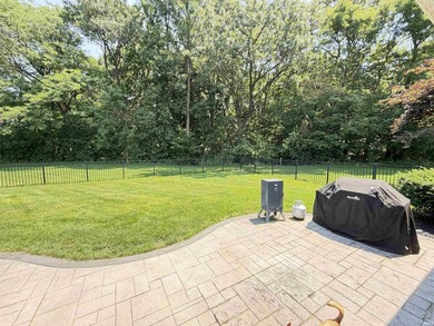 This 2016 ranch enjoys 300 feet of wooded creek frontage on just - photo 7