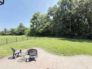 This 2016 ranch enjoys 300 feet of wooded creek frontage on just - photo 8