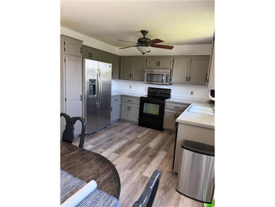 With some TLC, this home has potential to truly shine! Don't - photo 2