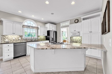 This custom one-owner home sits on 100 feet of frontage on - photo 8