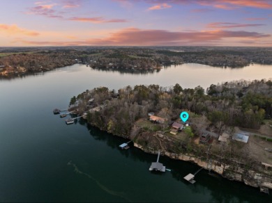 This charming two-story lake home offers stunning views and 1 - photo 3