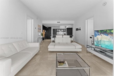 Live in the heart of Downtown Miami in this stunning 2 Bed + Den