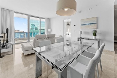 Live in the heart of Downtown Miami in this stunning 2 Bed + Den
