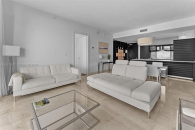 Live in the heart of Downtown Miami in this stunning 2 Bed + Den