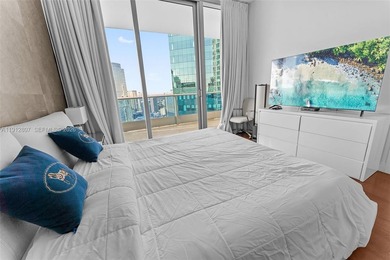 Live in the heart of Downtown Miami in this stunning 2 Bed + Den