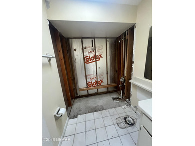 Discover the potential at 2 Seneca Path. This 3-bed, 2-bath home - photo 9