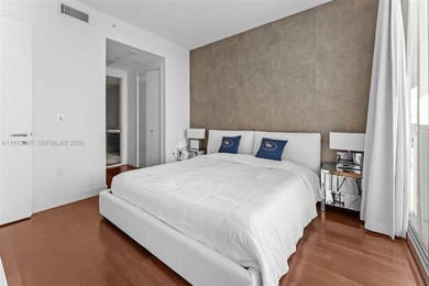 Live in the heart of Downtown Miami in this stunning 2 Bed + Den