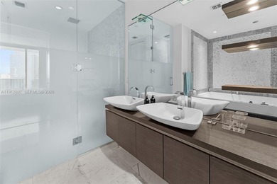 Live in the heart of Downtown Miami in this stunning 2 Bed + Den