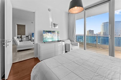 Live in the heart of Downtown Miami in this stunning 2 Bed + Den