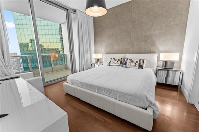 Live in the heart of Downtown Miami in this stunning 2 Bed + Den