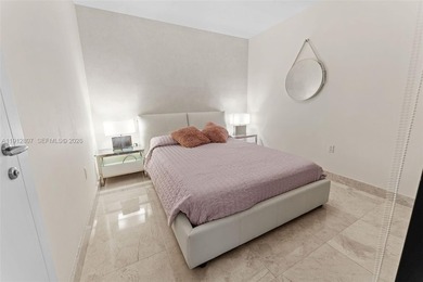 Live in the heart of Downtown Miami in this stunning 2 Bed + Den