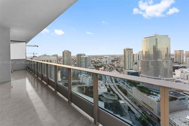 Live in the heart of Downtown Miami in this stunning 2 Bed + Den