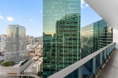 Live in the heart of Downtown Miami in this stunning 2 Bed + Den