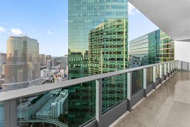 Live in the heart of Downtown Miami in this stunning 2 Bed + Den