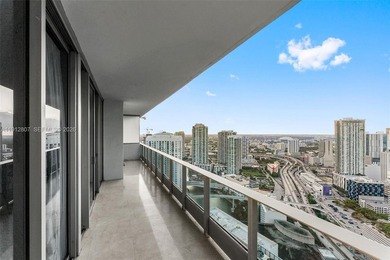 Live in the heart of Downtown Miami in this stunning 2 Bed + Den