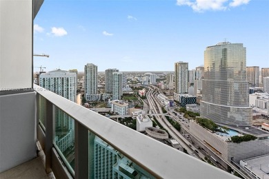 Live in the heart of Downtown Miami in this stunning 2 Bed + Den