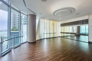 Live in the heart of Downtown Miami in this stunning 2 Bed + Den