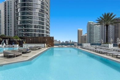 Live in the heart of Downtown Miami in this stunning 2 Bed + Den