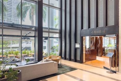 Live in the heart of Downtown Miami in this stunning 2 Bed + Den