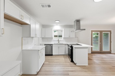 Welcome home to this beautifully updated property featuring - photo 6