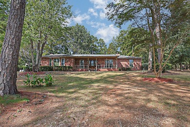 Secluded Brick Ranch Retreat on 20+ Acres with Private Lake & - photo 2