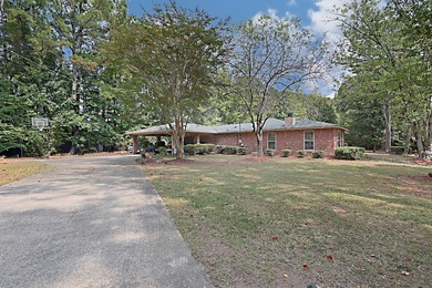 Secluded Brick Ranch Retreat on 20+ Acres with Private Lake & - photo 3